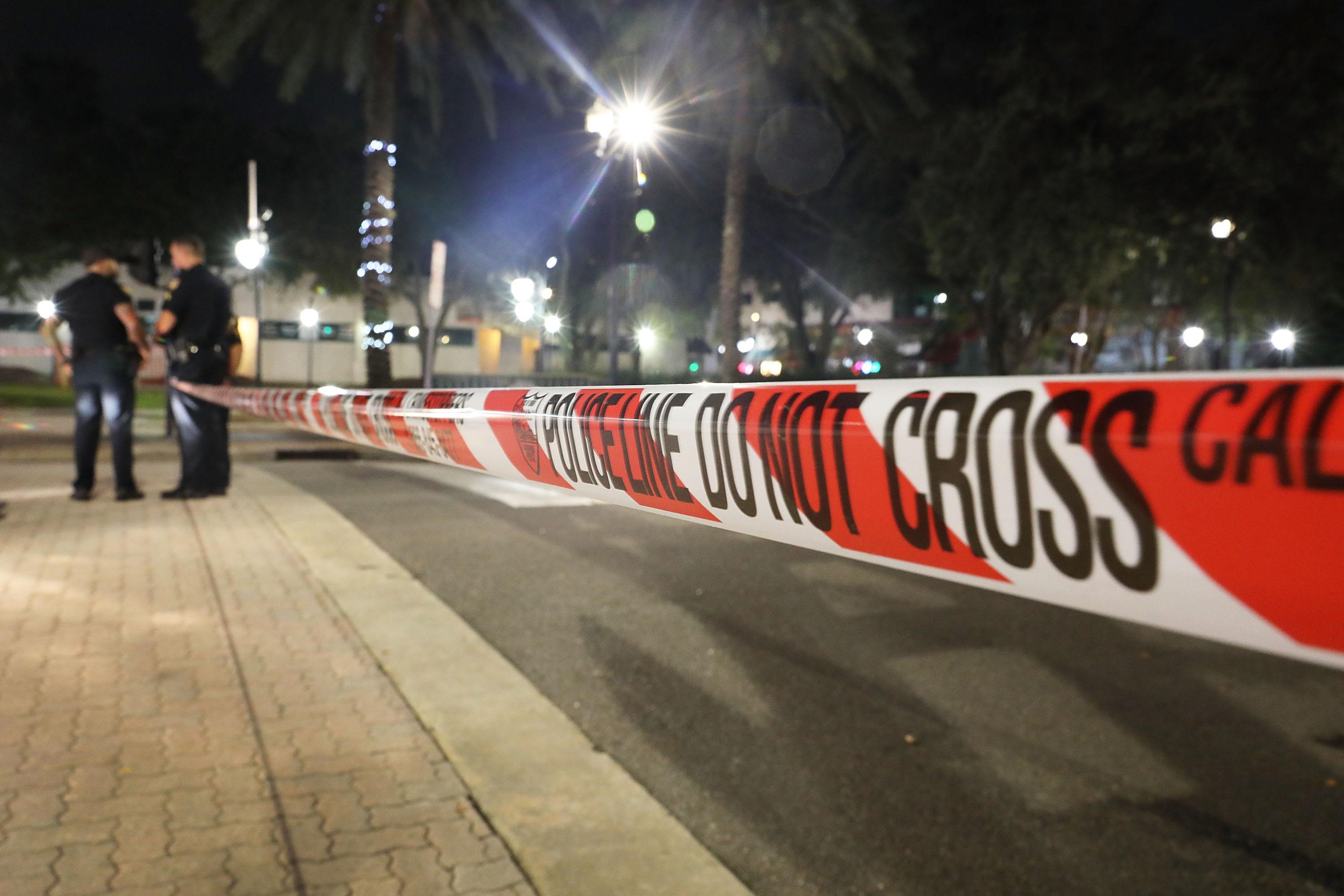 Police tape is seen as law enforcement officials investigate a shooting at the GLHF Game Bar located in the Jacksonville Landing on August 27, 2018 in Jacksonville, Florida.