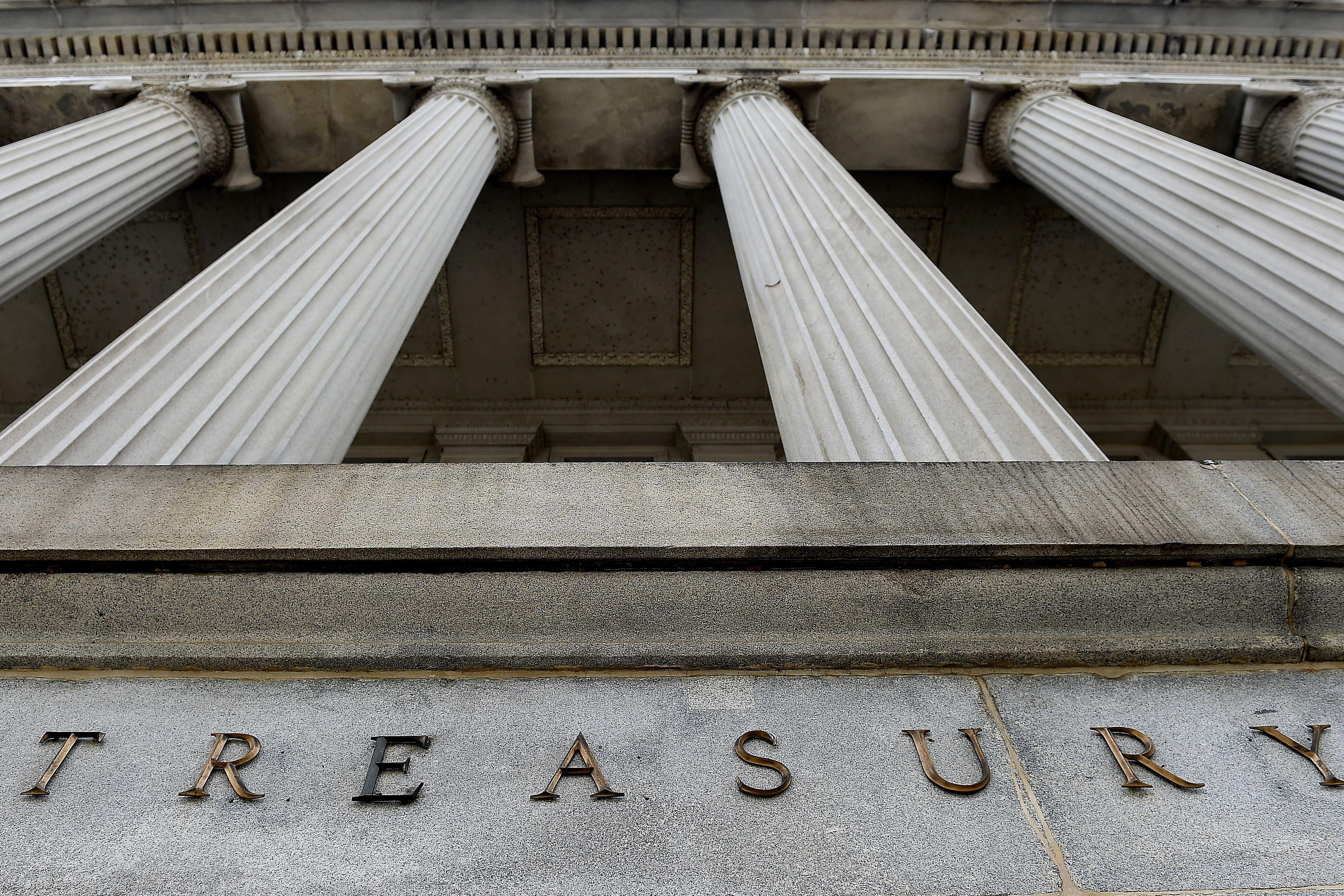 An exterior view of the building of US Department of the Treasury is seen on March 27, 2020 in Washington, DC. - US Treasury Secretary Steven Mnuchin on Friday pledged to quickly send cash to Americans as part of the a massive $2.2 trillion relief package aimed at rescuing the coronavirus-battered economy. (Photo by Olivier DOULIERY / AFP) (Photo by OLIVIER DOULIERY/AFP via Getty Images)