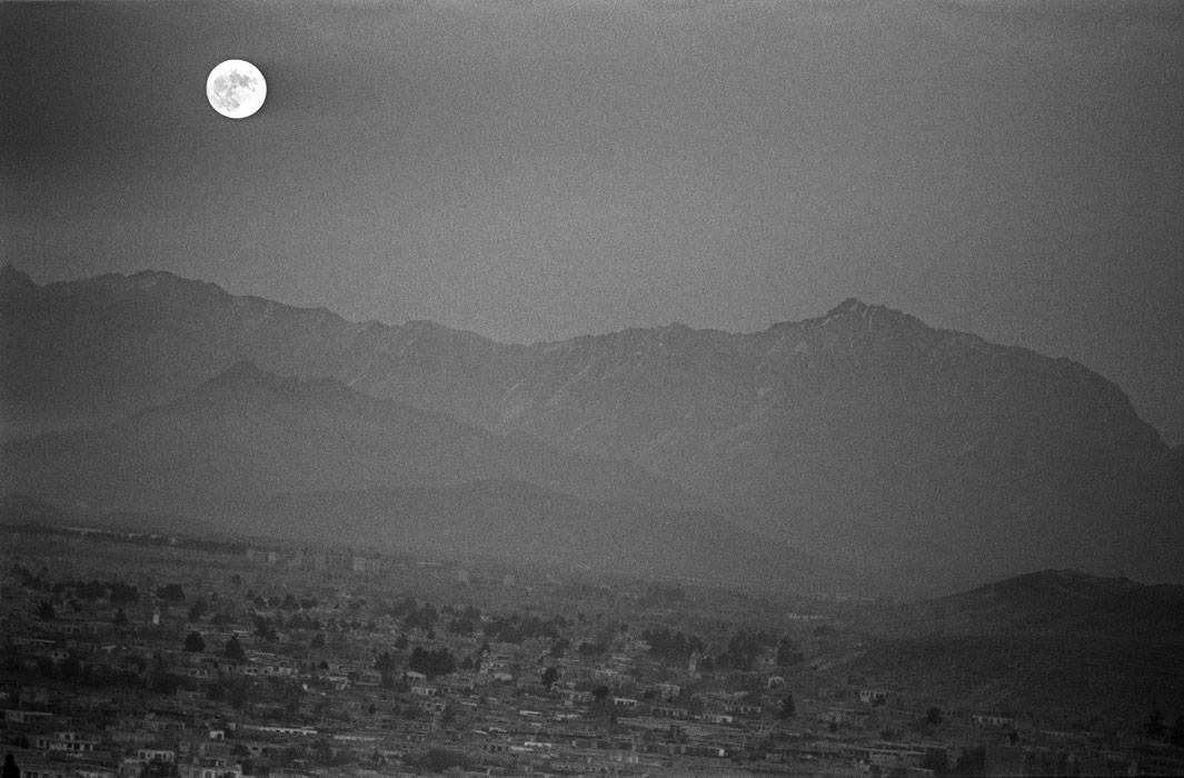 Landscape of Kabul with full moon during the Taliban regime in Kabul, Afghanistan on November 20.1996