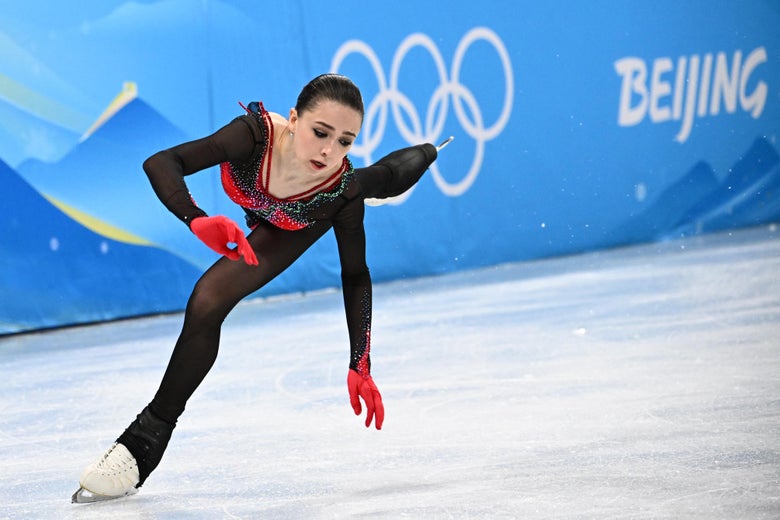 Valieva leaning forward on her left leg on the ice
