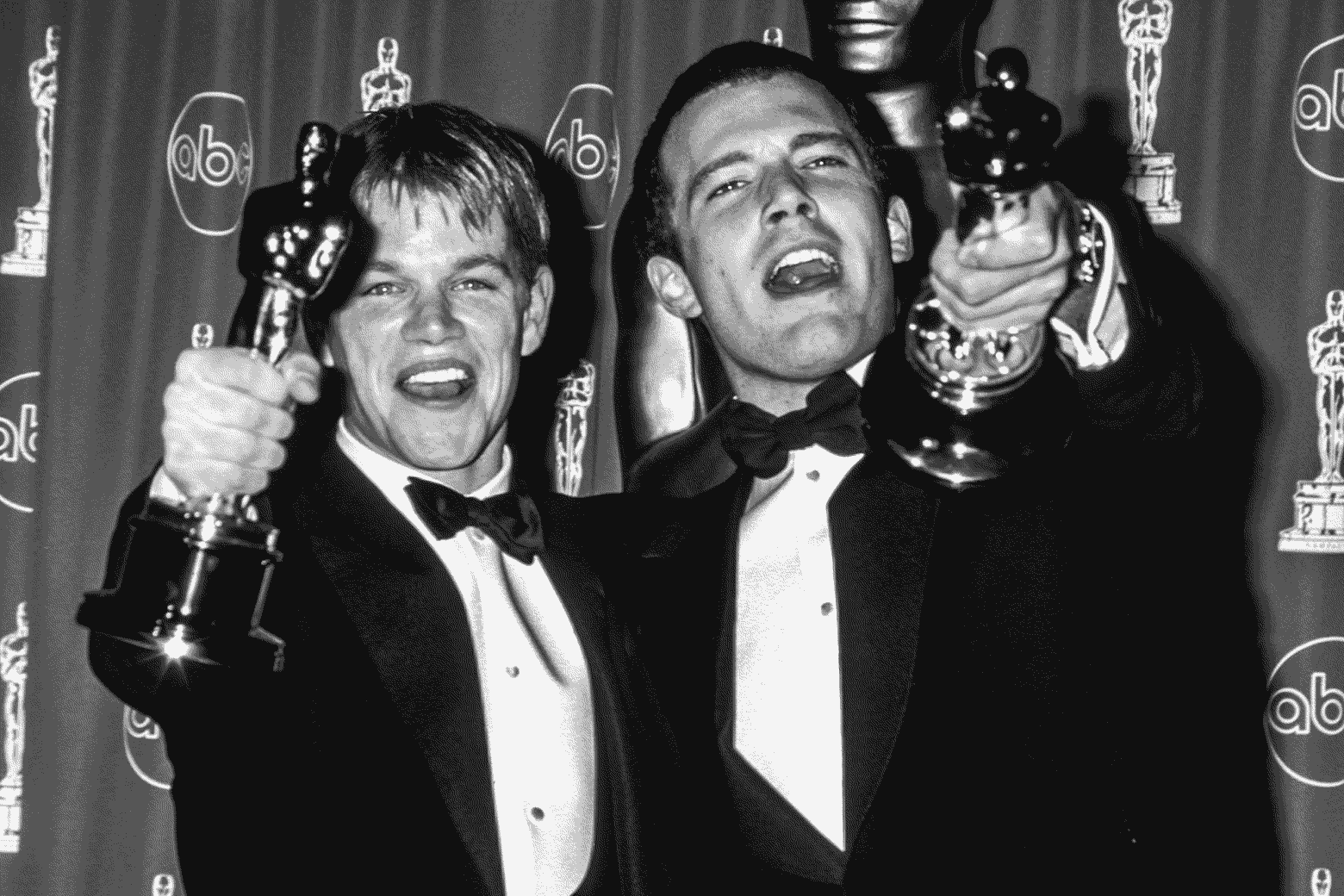 Matt Damon and Ben Affleck winning an Oscar, and clearly cursed.