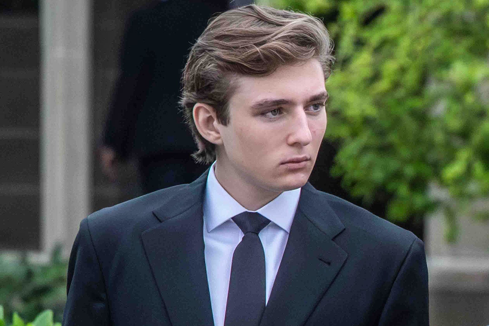 Barron Trump in a suit. He is 18 and very tall. 