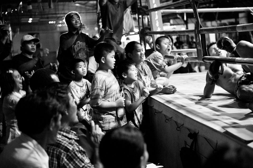 Spectators at a boxing match.