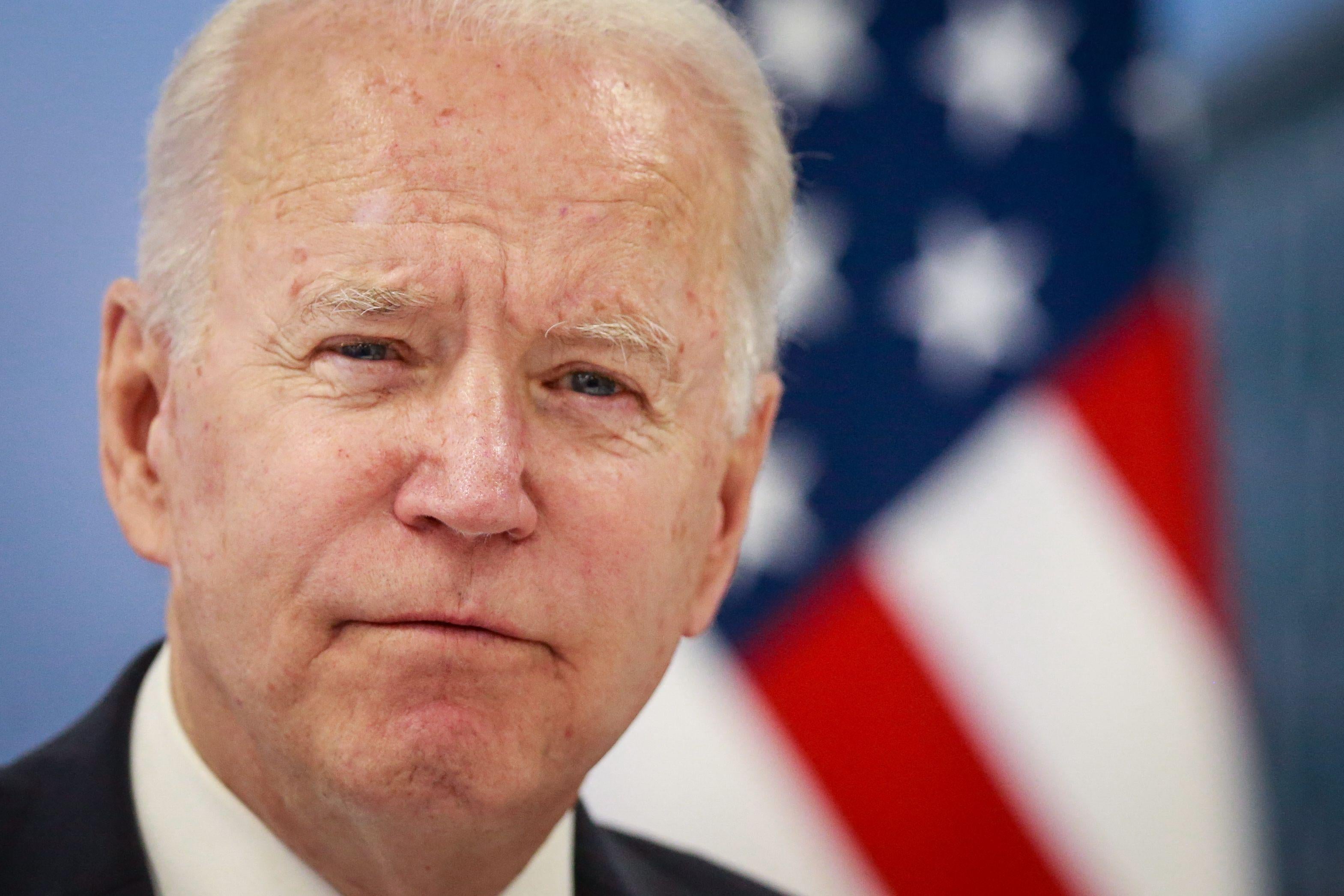 A close-up of Biden's face, looking grave.