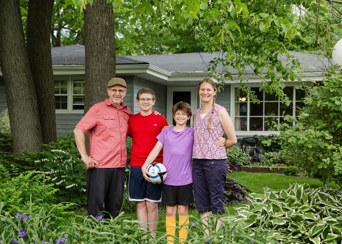 The Wells Family:  Bob, David, Mary (age 12), and Jean, photogra,The Wells Family:  Bob, David, Mary (age 12), and Jean, photographed in front of their home in Brown Deer.