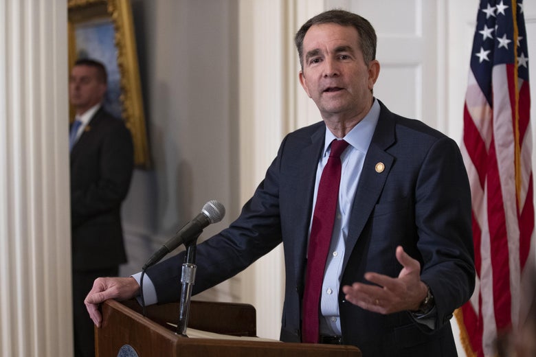 Virginia Gov. Ralph Northam speaking at a lectern