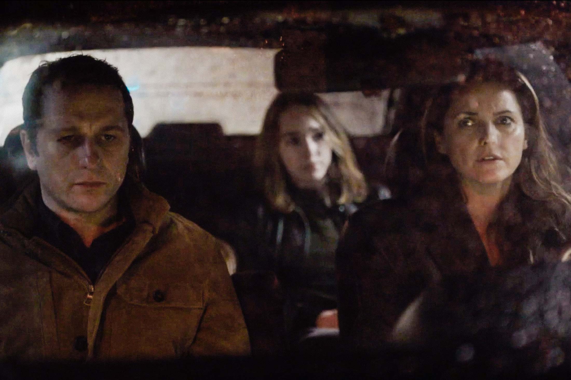 Philip, Elizabeth, and Paige in a car on The Americans.