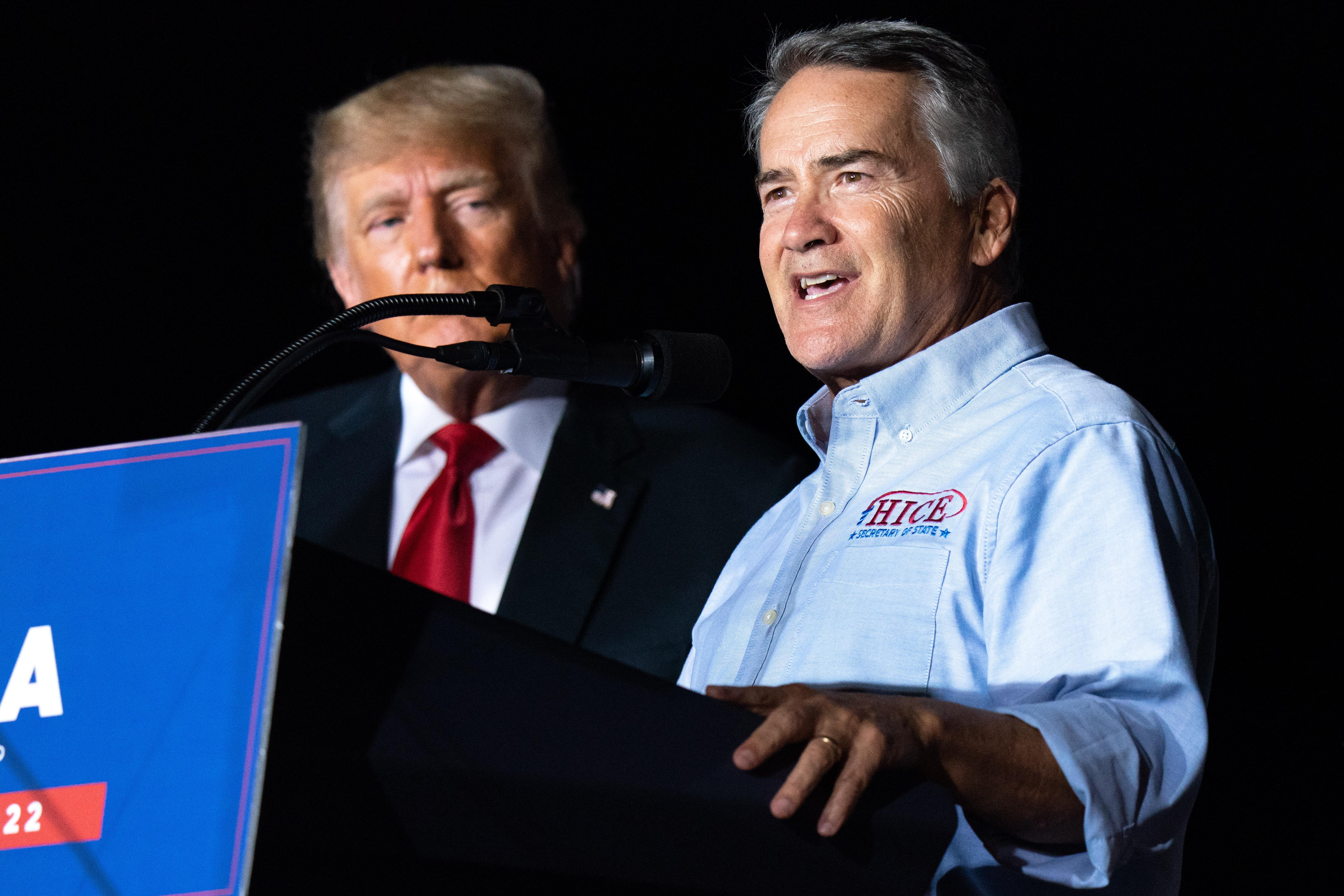 Rep. Jody Hice (R-GA) speaks to the crowd during a rally as former US President Donald Trump watches on September 25, 2021 in Perry, Georgia. 