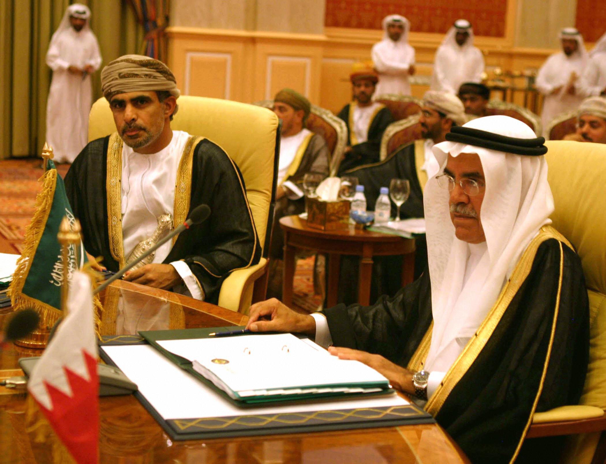 Saudi's Oil Minister Ali al-Nuaimi, right, sits next to Oman's Oil and Gas minister Mohammad bin Hamad bin Saif al-Romhi.