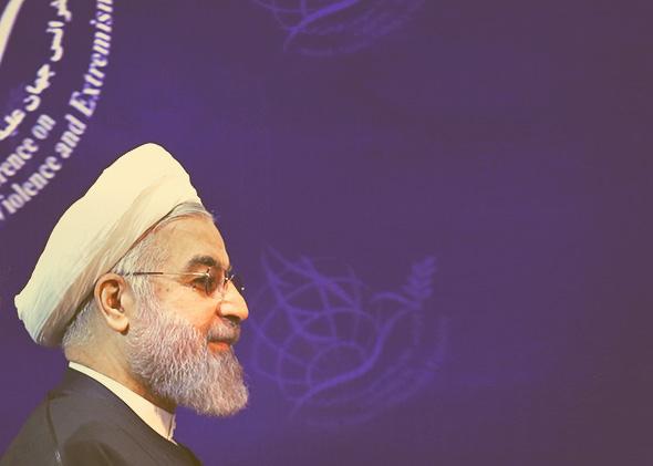 Iran’s President Hassan Rouhani opens a two-day conference on combatting extremism on Dec. 9, 2014, in the Iranian capital of Tehran