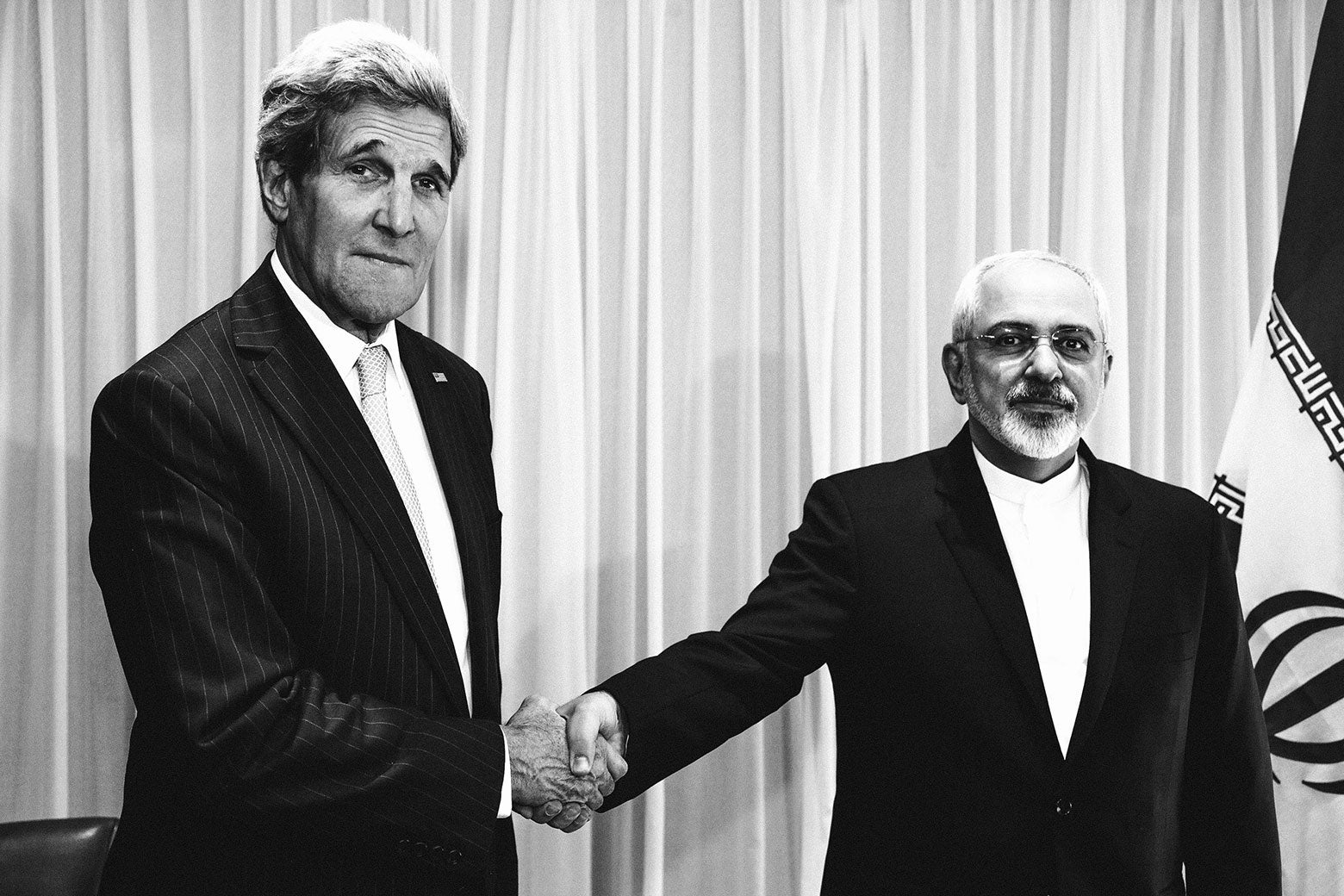 Iranian Foreign Minister Mohammad Javad Zarif shakes hands with U.S. Secretary of State John Kerry in Geneva on Jan. 14, 2015.