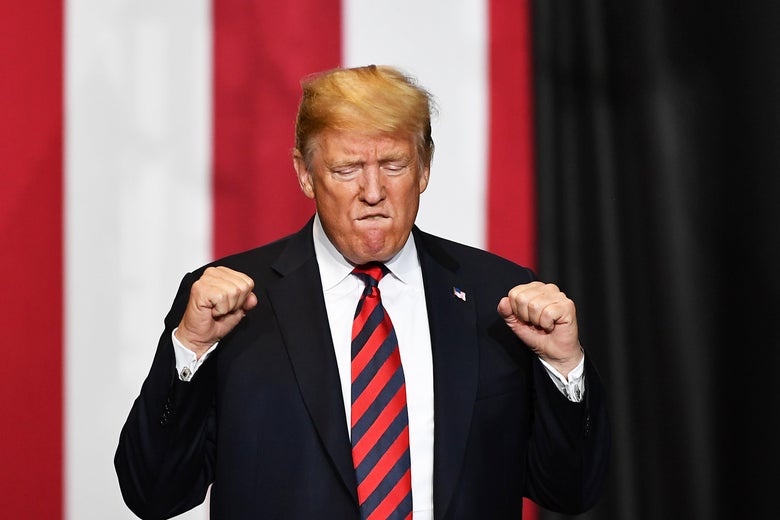 President Donald Trump arrives on stage to speak at a rally at JQH Arena in Springfield, Missouri on September 21, 2018. 