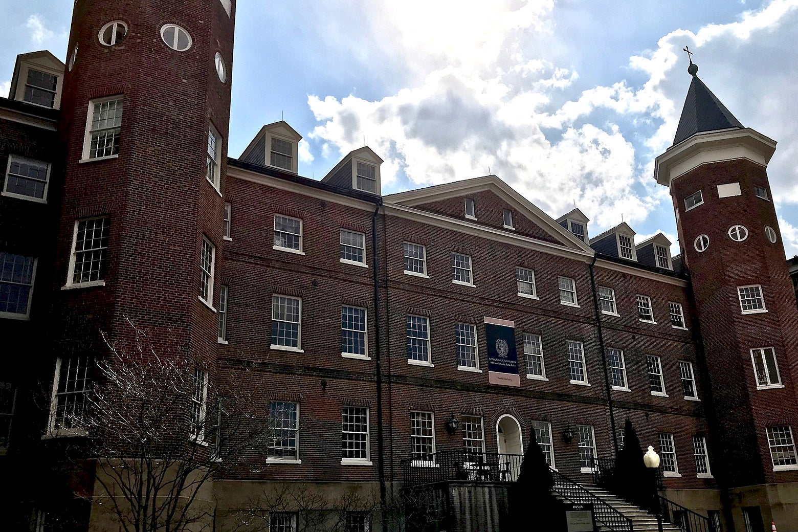 The stately red brick 3-story Old North Hall on the Georgetown University campus.
