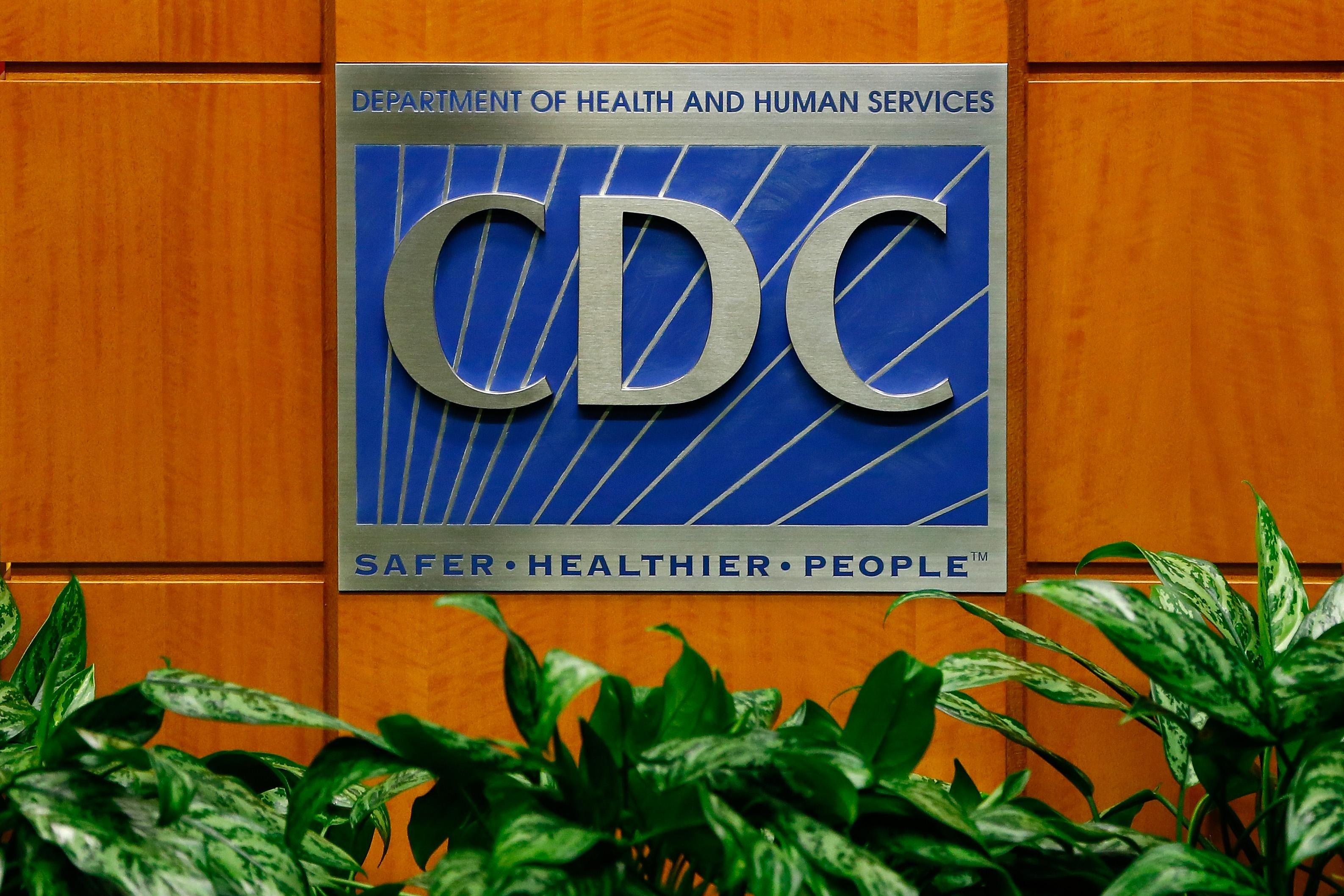 The CDC logo on a podium