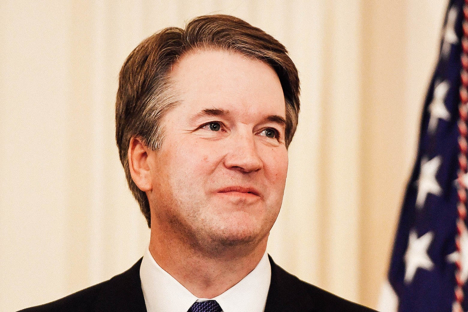 Brett Kavanaugh looks on as Donald Trump announces him as his nominee to the Supreme Court.