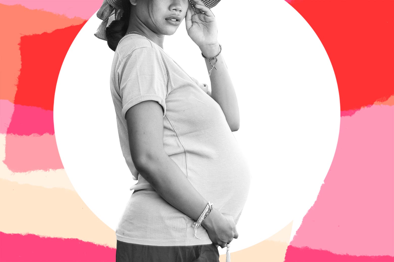 A pregnant woman looking worried.