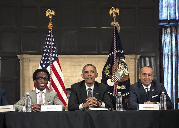 President Barack Obama participates in a roundtable discussion with young people at an event at Lehman College launching the My Brothers Keeper Alliance.