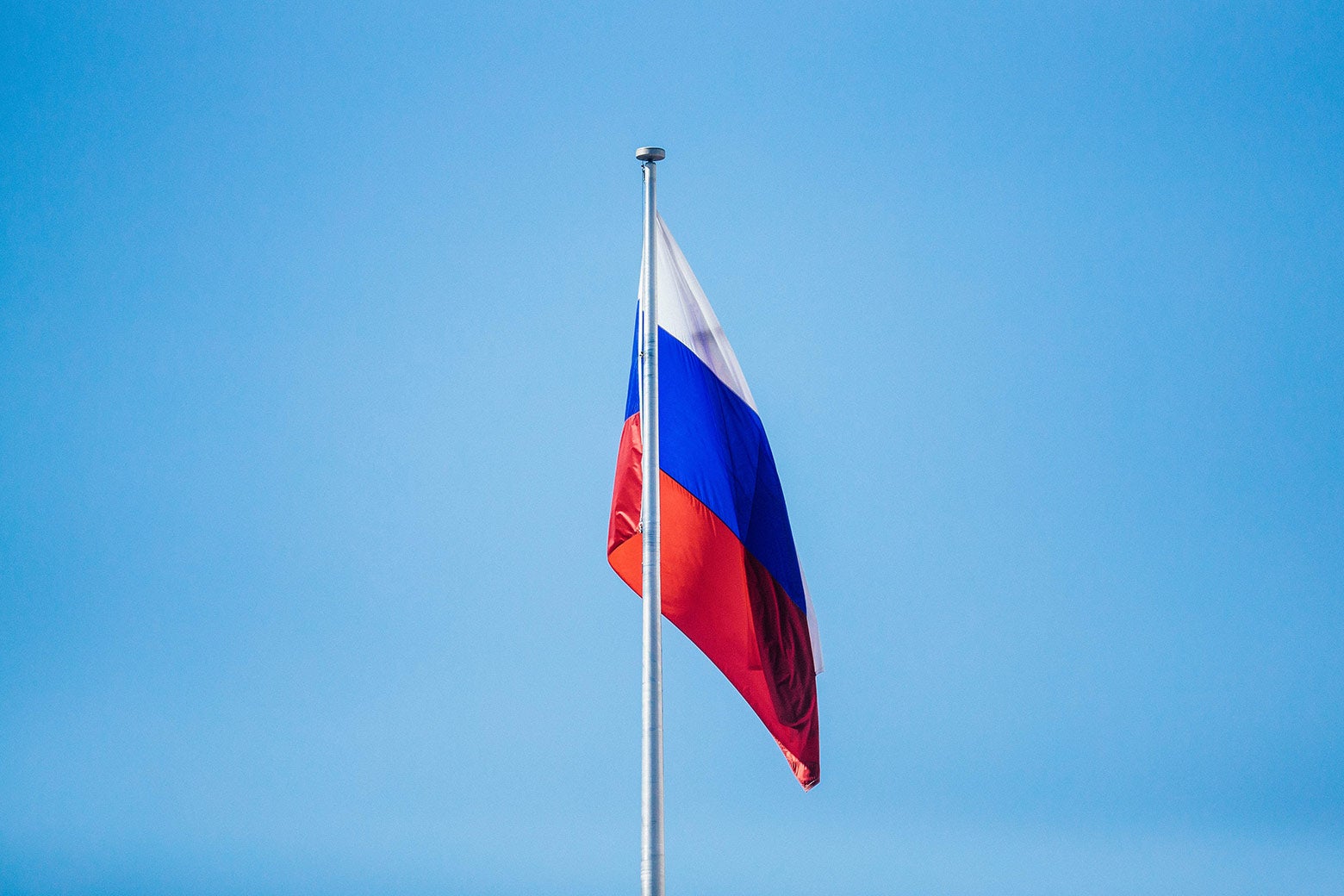 The flag of the Russian Federation flies above the Russian Embassy on March 31 in Washington.