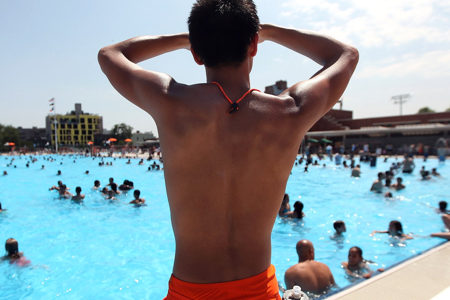A lifeguard keeps watch of the newly renovated McCarren Park Pool.