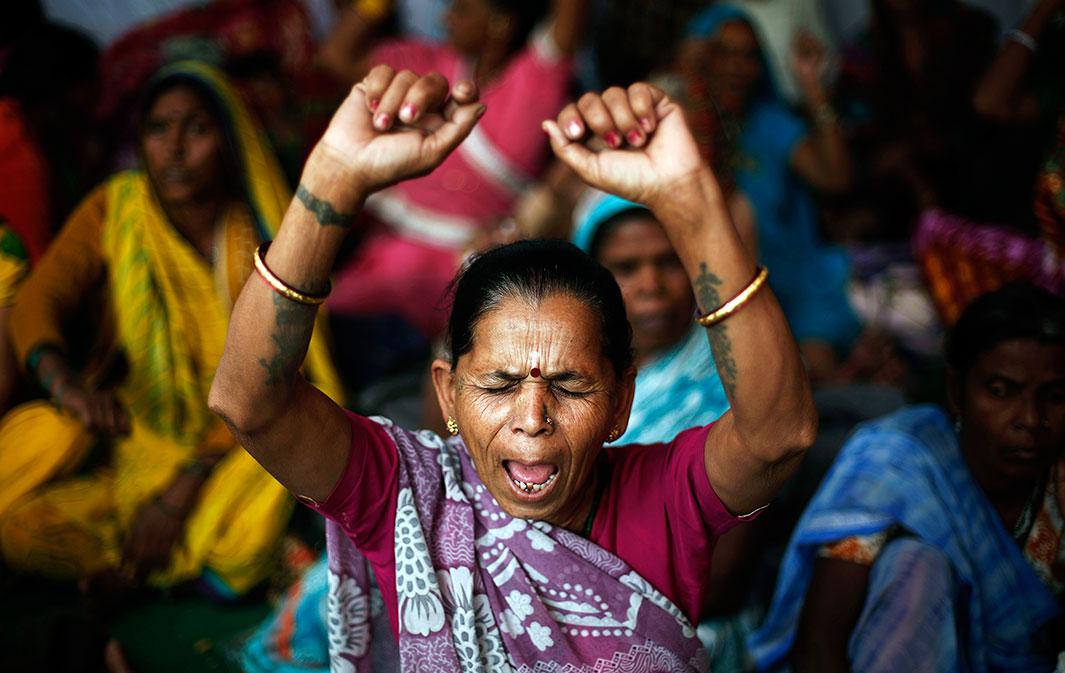Victims of the Bhopal, India, gas tragedy, a gas leak from a Union Carbide pesticide plant that killed at least 3,500 people, shout slogans during a sit-in protest in New Delhi on Nov. 10, 2014. Hundreds of the victims held a sit-in protest and five survivors of the tragedy started an indefinite hunger strike demanding additional compensation for all the affected people and revision of figures of death caused by the disaster 30 years ago, according to a media release. 