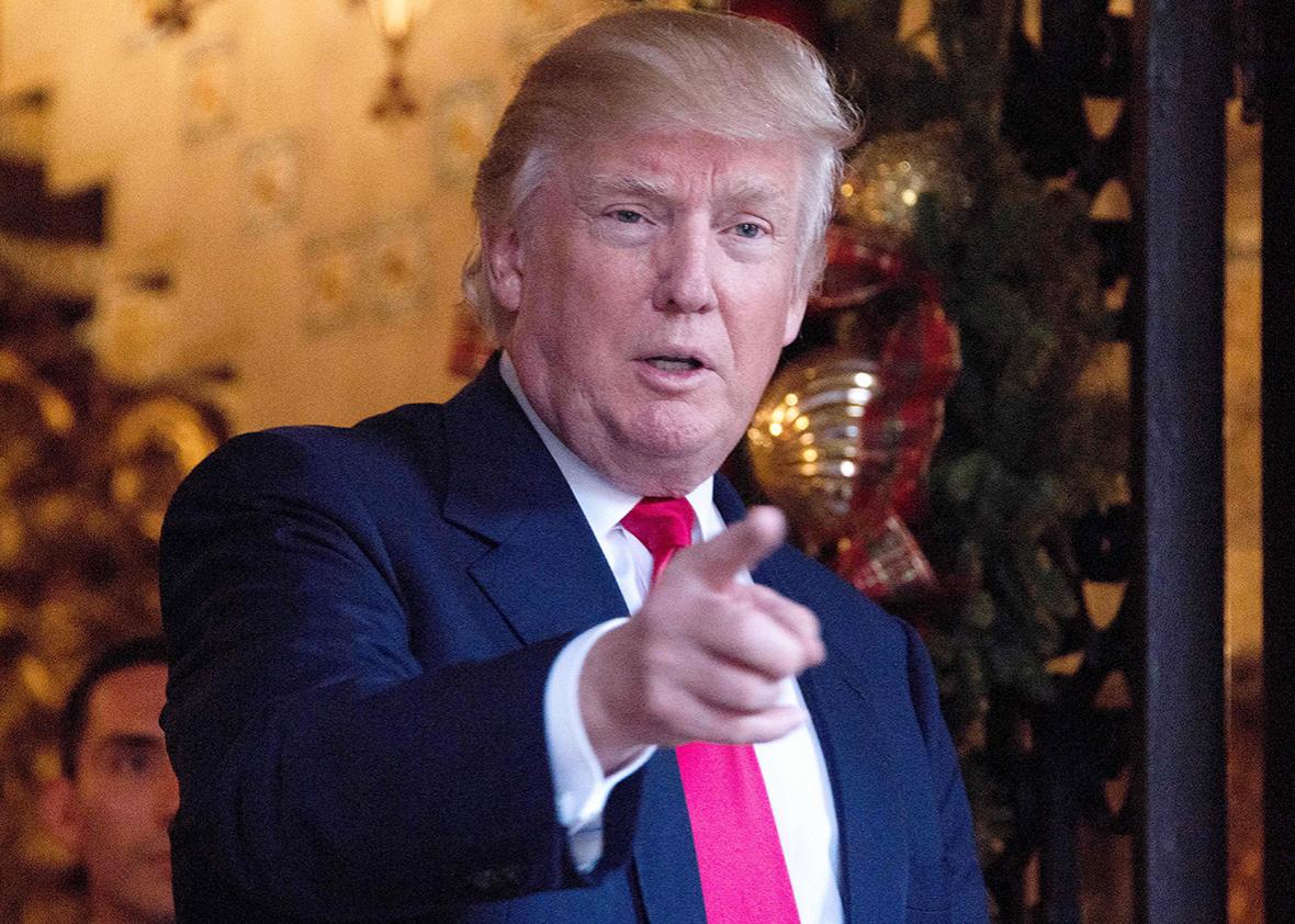 US President-elect Donald Trump speaks to reporters at Mar-a-Lago in Palm Beach, Florida where he is taking meetings on December 21, 2016.