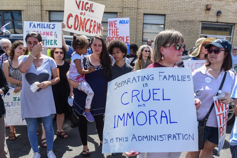 People participate in a protest against recent U.S. immigration policy of separating children from their families when they enter the United States as undocumented immigrants, in front of a Homeland Security facility in Elizabeth, N.J. on June 17, 2018. 