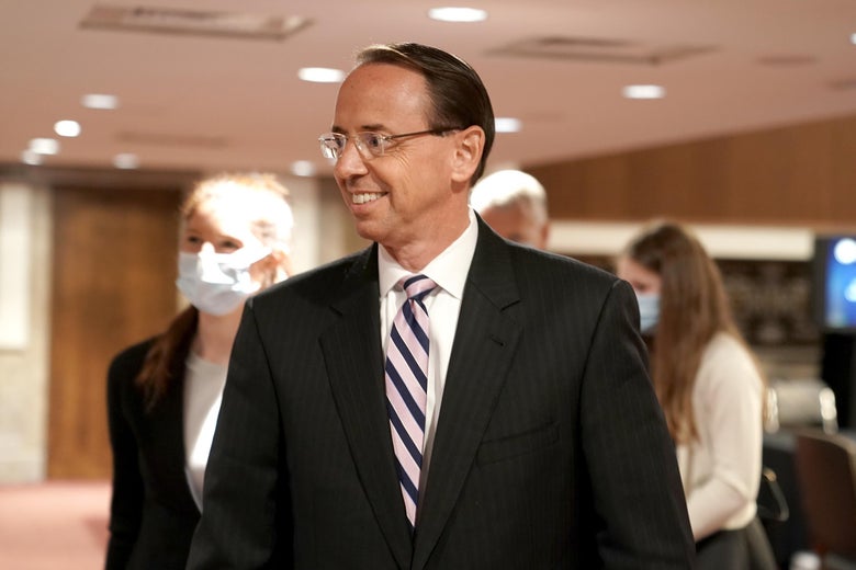 Former Deputy Attorney General Rod Rosenstein smiles widely as he leaves after a Republican-led Senate Judiciary Committee hearing on "Crossfire Hurricane", the FBI's probe into Russian election interference and the 2016 Trump campaign in the Dirksen Senate Office Building in Washington, DC,on June 3, 2020.