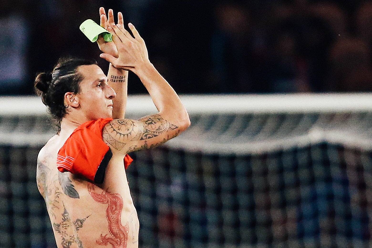 A dragon tattoo is seen along Zlatan Ibrahimovic’s torso.
