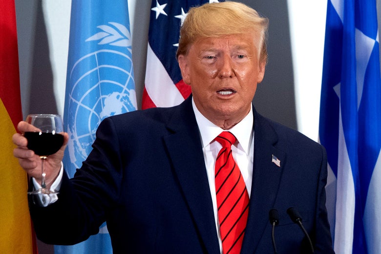 Donald Trump raises a glass at the United Nations General Assembly.