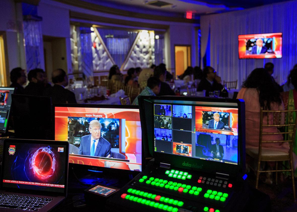 Time Television, a bilingual station catering to New York City's Bangladeshi and South Asian community, airs a live broadcast at a celebration during the presidential debates on September 26th, 2016 in Queens, New York.