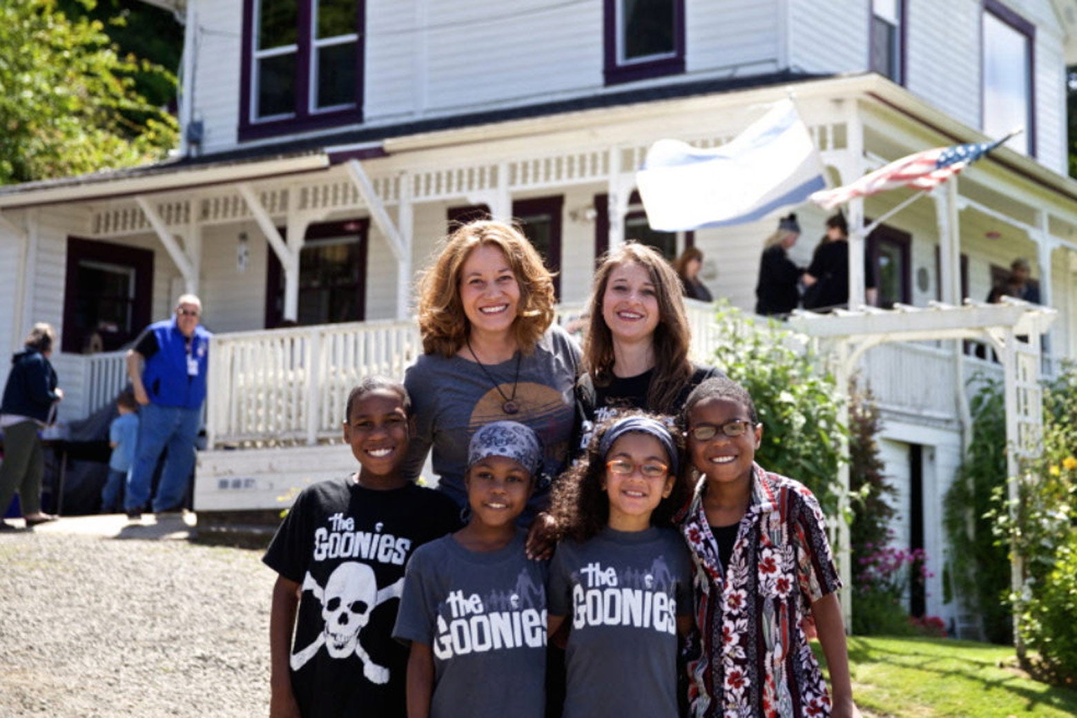 This June 2014 photo shows Devonte Hart with his family at the annual celebration of "The Goonies" movie in Astoria, Ore. 