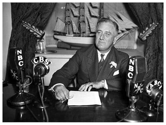 Franklin D. Roosevelt during one of his fireside chats, on August 1933.