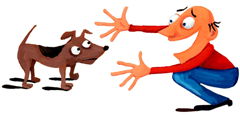 Man reaching out towards a dog