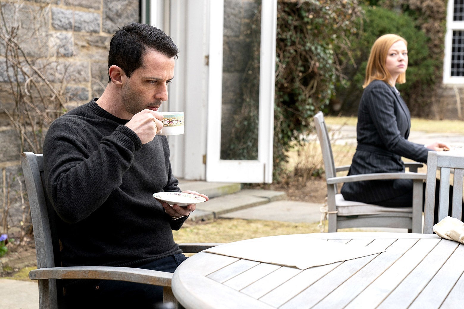 Jeremy Strong drinking coffee in a scene from Succession.