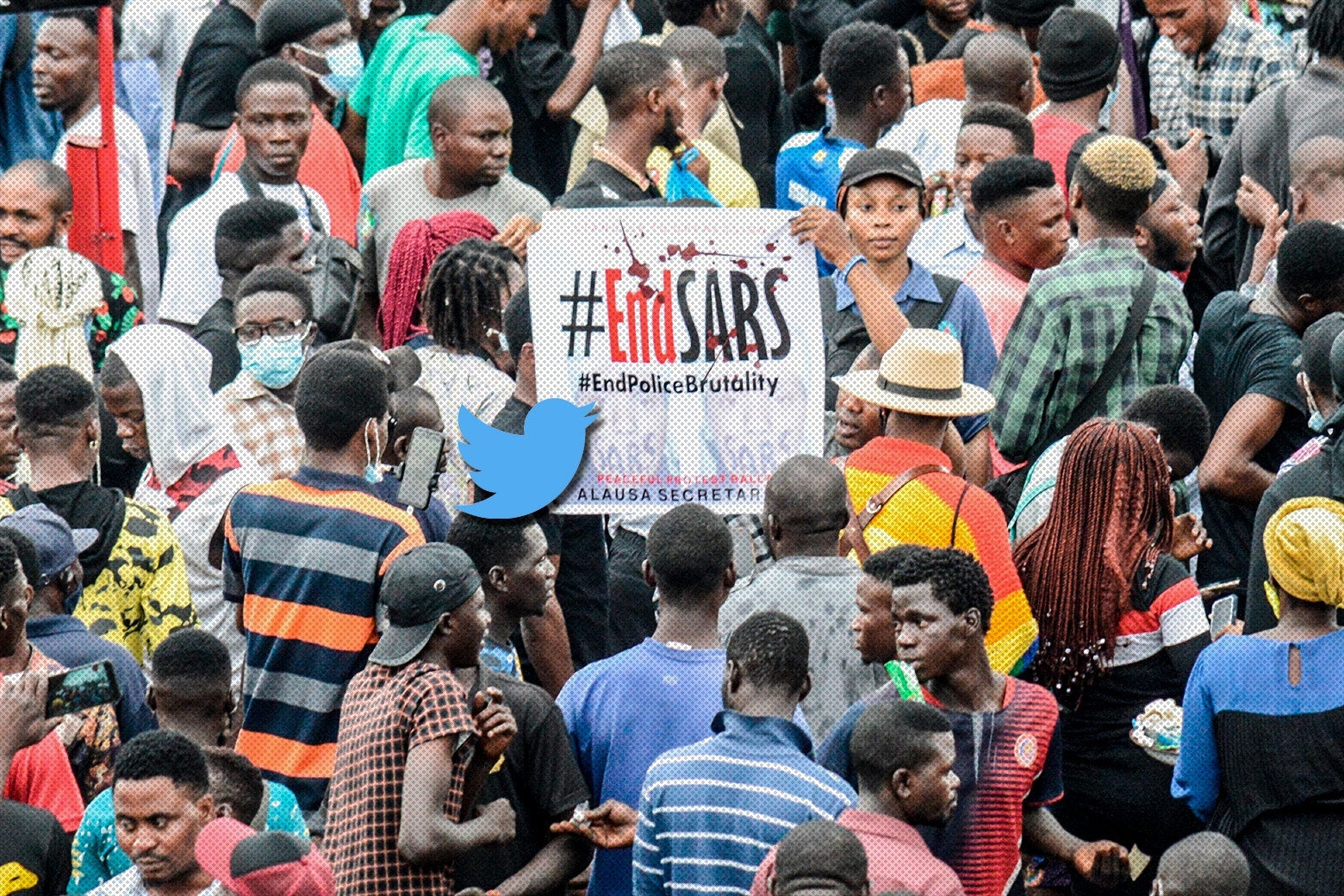 Twitter bird hovering over an #EndSARS poster amid a crowd of protesters