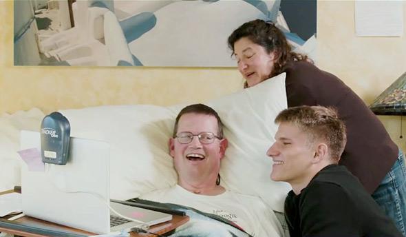 Henry Evans at home with his wife, Jane, and son Mike.