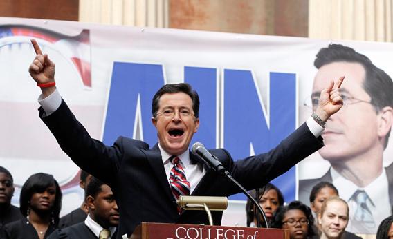 Stephen Colbert hosts a South Carolina primary rally with former Republican Presidential candidate Herman Cain, at the College of Charleston, South Carolina, January 20, 2012.