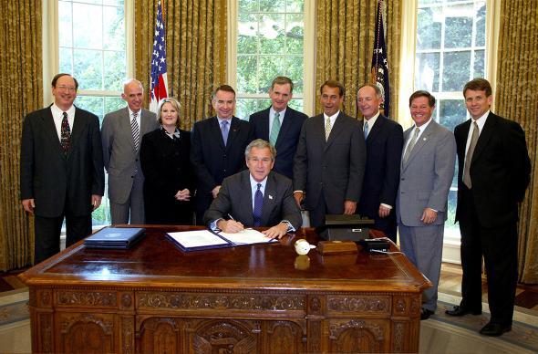 President George W. Bush signs S. 342, the Keeping Children and 