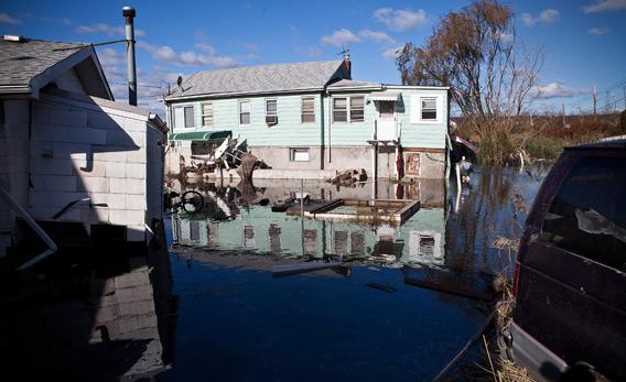 A seriously damaged home is seen in the flooded Midland Beach neighborhood of Staten Island on Saturday in New York City.