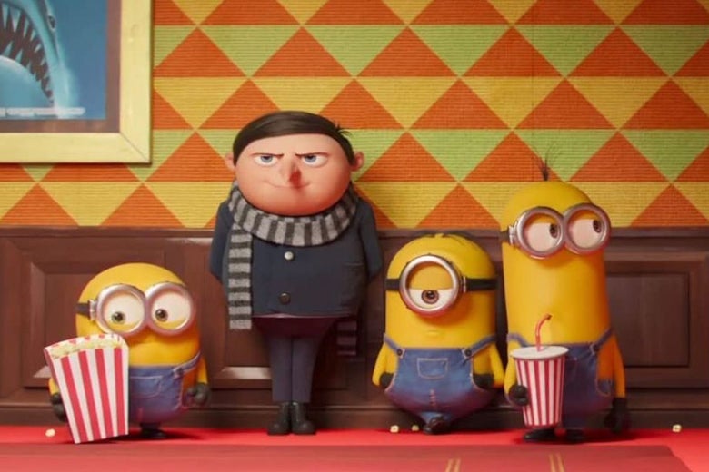 A young Gru from the Despicable Me movies, flanked by three Minions with popcorn and soda.