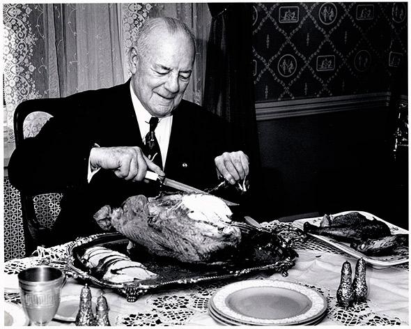 Duncan Hines carving a turkey, 1953. 