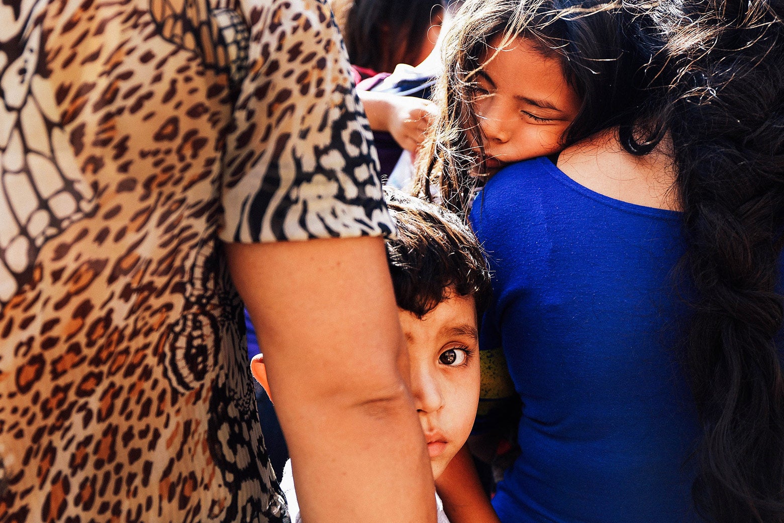 Immigrant families arrive at a Texas bus station.