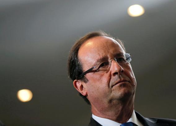 French President Francois Hollande visits the IXBlue company in Marly-le-Roi near Paris.