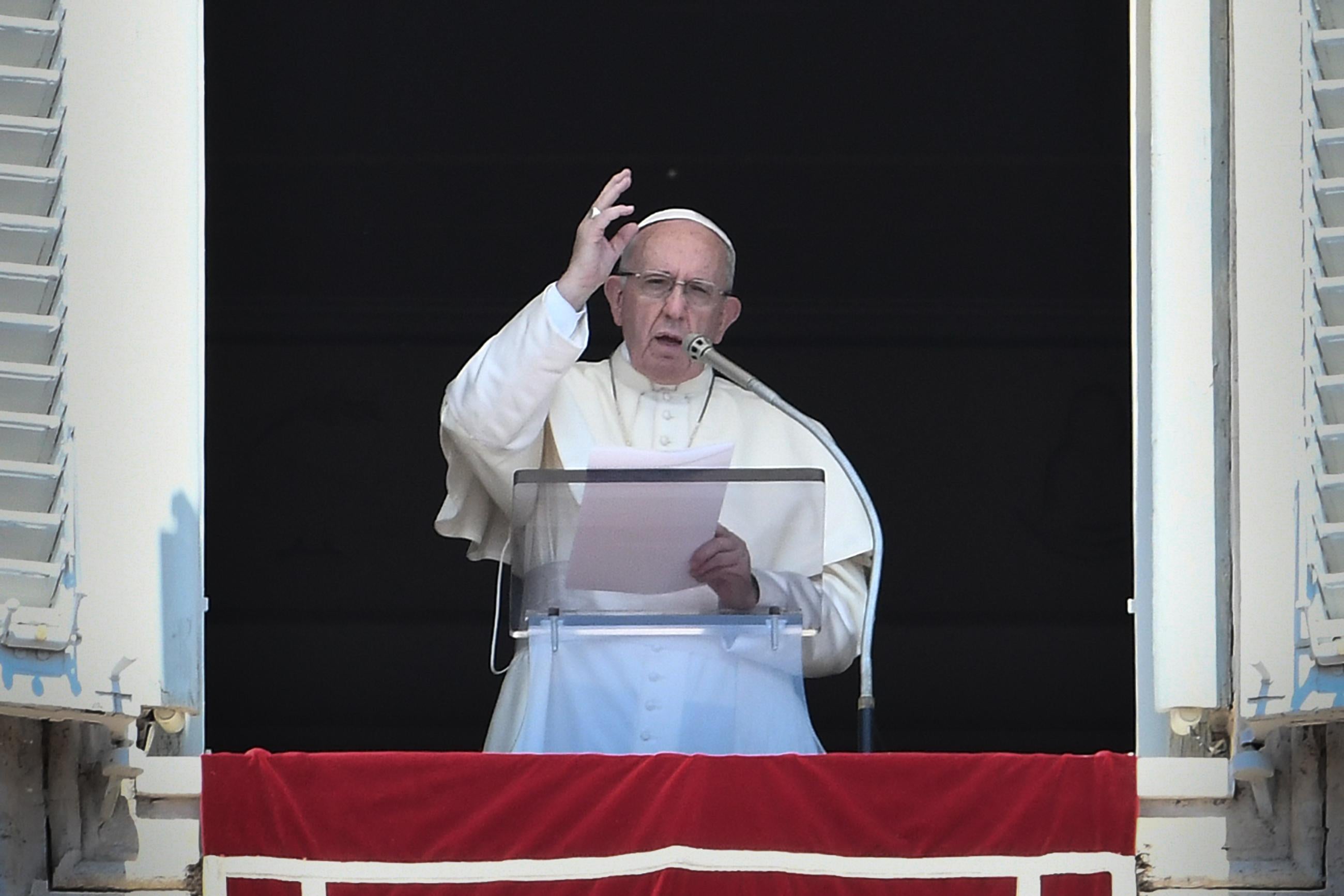 Pope Francis speaks from a window of the Apostolic Palace at St. Peter’s Square in the Vatican.