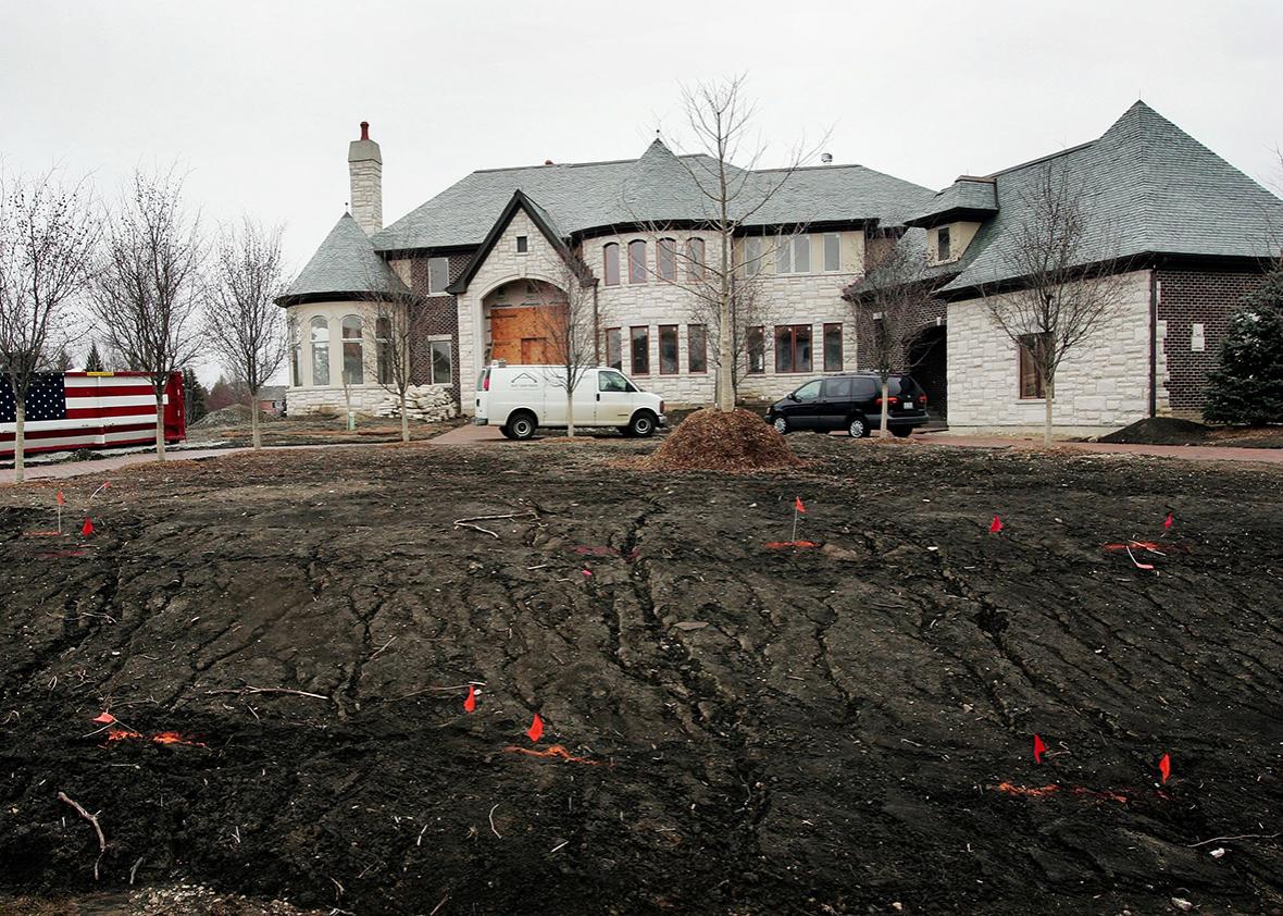 A home stands in the later stages of construction March 24, 2006 in Inverness, Illinois. Nationwide new home sales plummeted more than 10 percent in February to their lowest levels in nine years.  