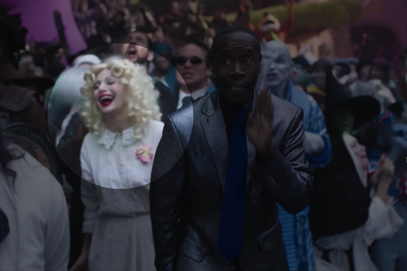 A still from Space Jam showing Baby Jane Hudson cheering on a basketball game from the sidelines.
