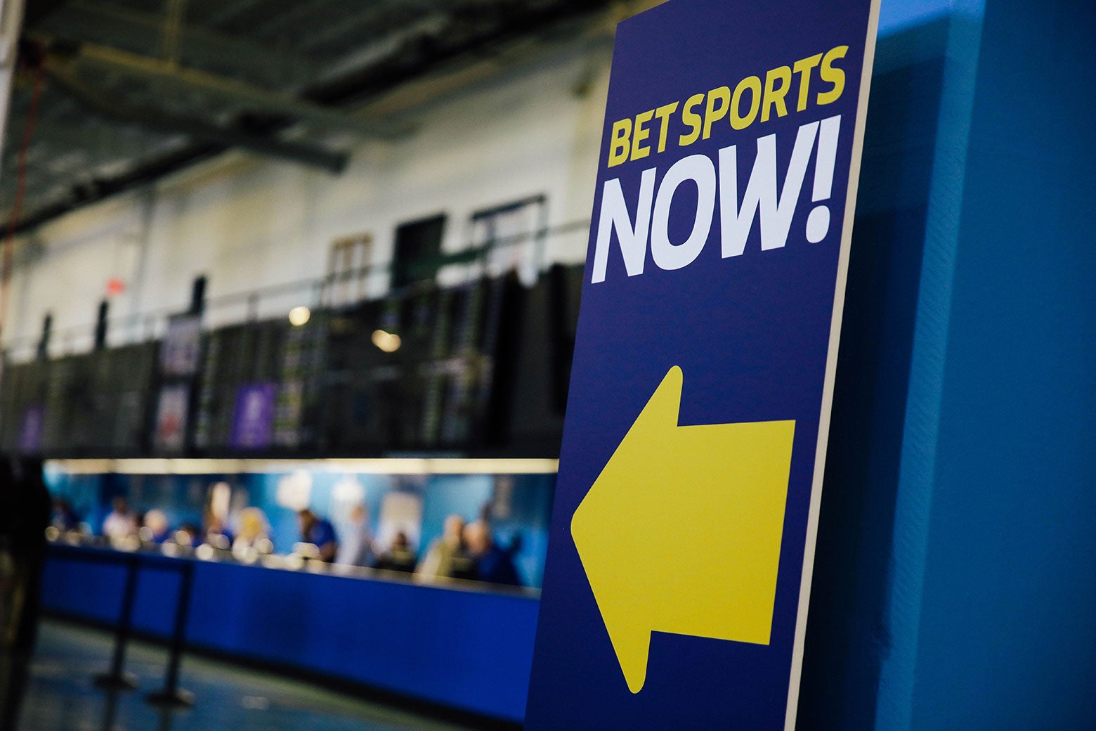 "Bet Sports Now!" sign at The Monmouth Park Sports Book is viewed on the first day of legal sports betting in New Jersey on June 14.