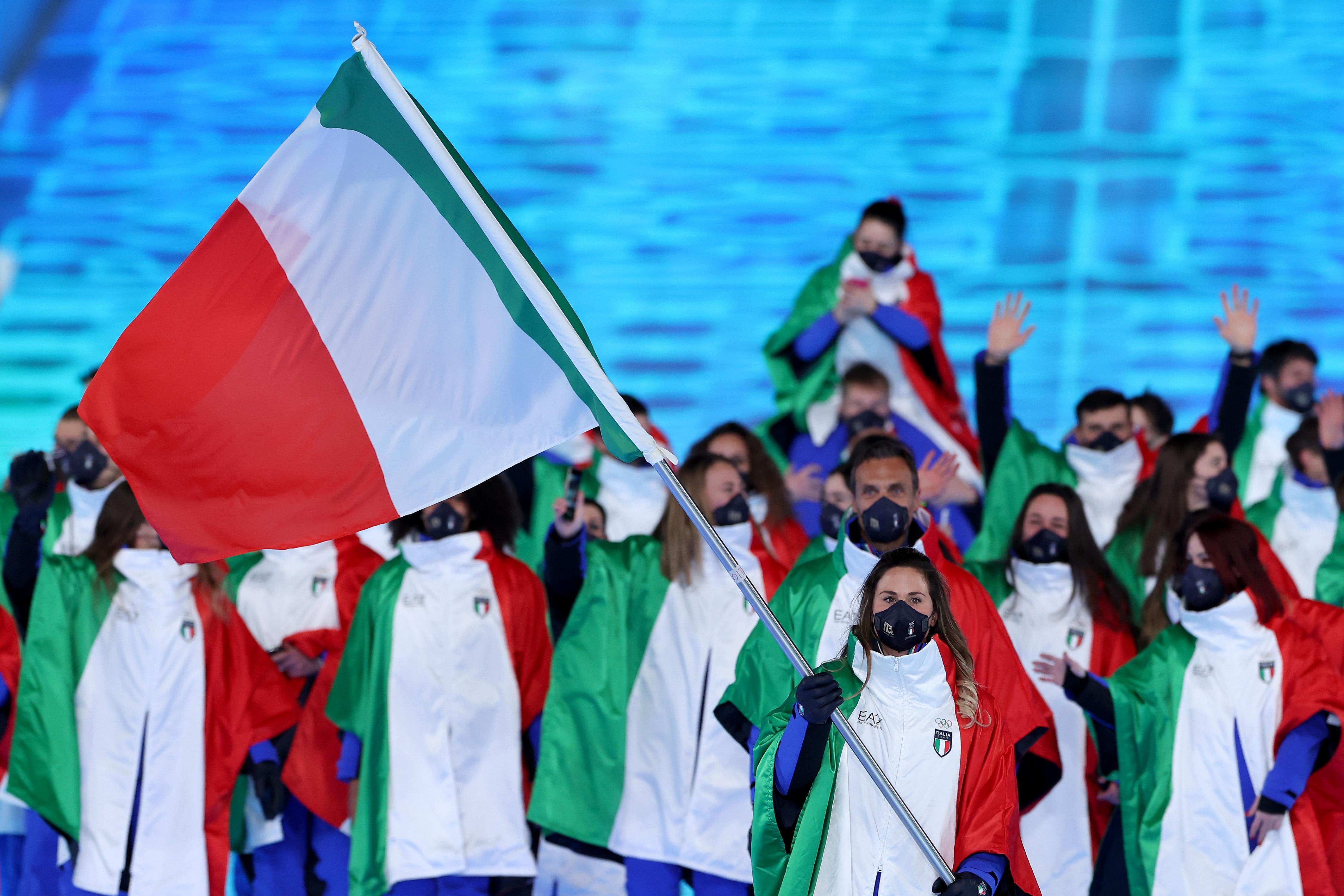 Italy's delegation marches as a group.