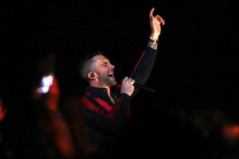 Adam Levine of Maroon 5, singing.