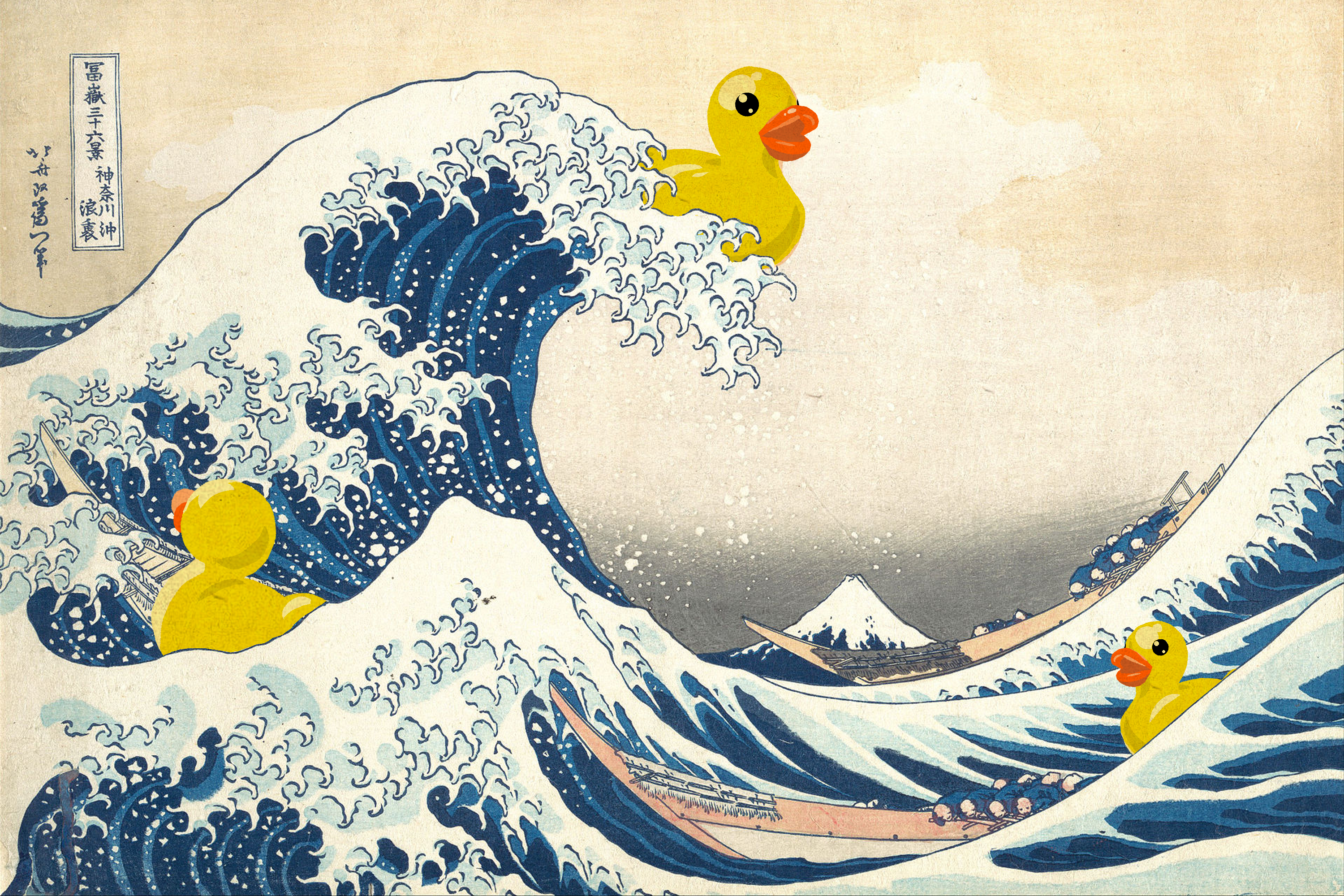 A rubber duckie riding a wave.